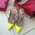 Valentino Rockstud Neon Leather Pumps in Yellow