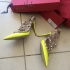 Valentino Rockstud Neon Leather Pumps in Yellow