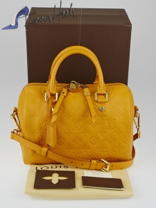 Louis Vuitton Safran Monogram Empreinte Leather Speedy Bandouliere yellow